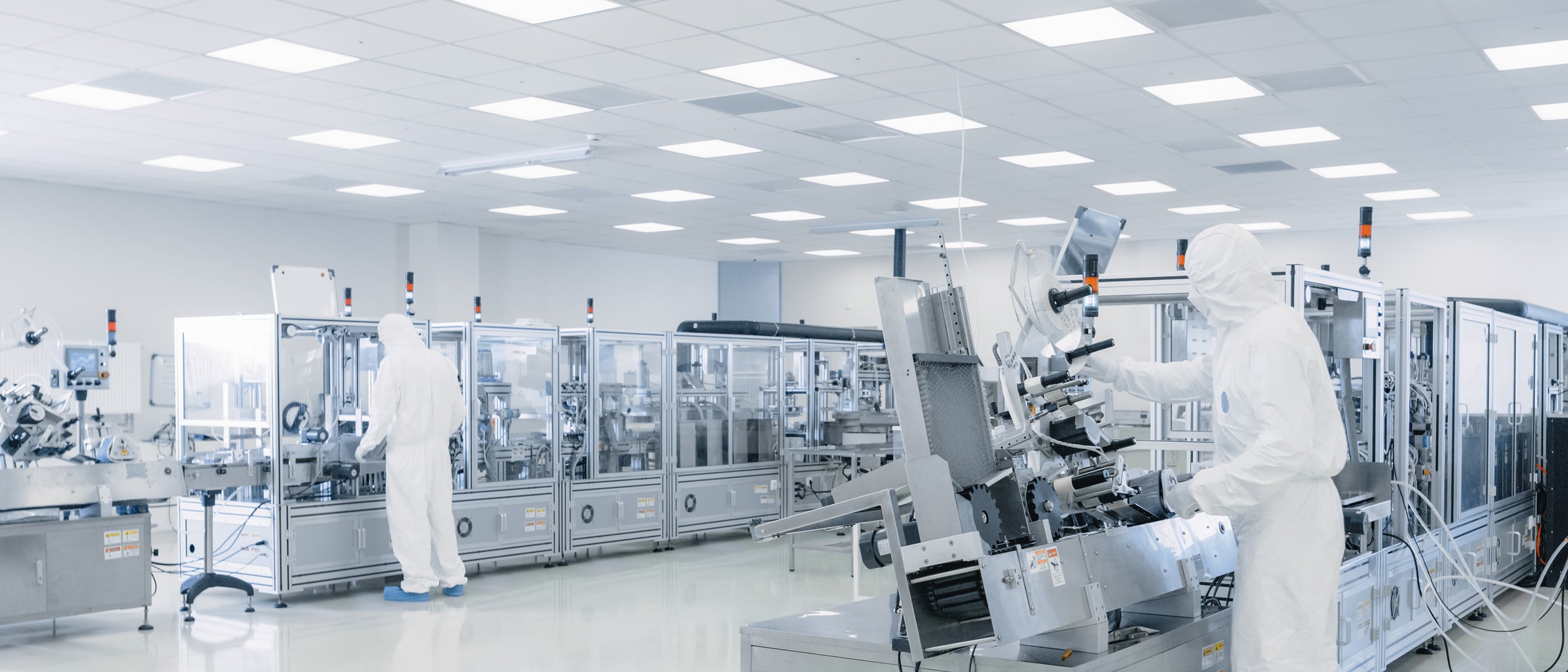 Automated pharmaceutical manufacturing line in a clean production facility